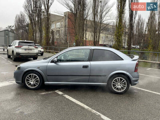 Серый Опель Астра, объемом двигателя 2 л и пробегом 185 тыс. км за 6800 $, фото 4 на Automoto.ua