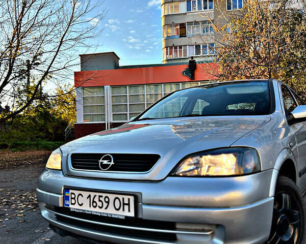 Серый Опель Астра, объемом двигателя 1.6 л и пробегом 110 тыс. км за 2800 $, фото 3 на Automoto.ua
