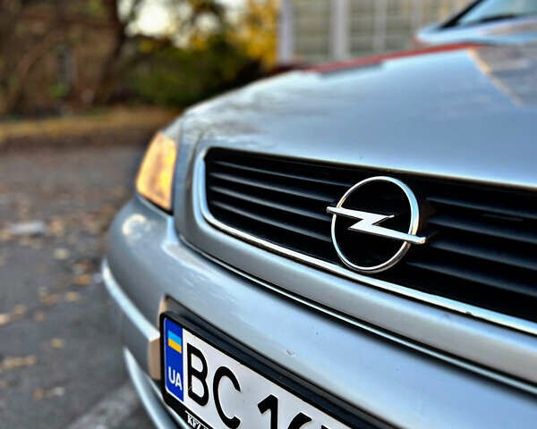 Серый Опель Астра, объемом двигателя 1.6 л и пробегом 110 тыс. км за 2800 $, фото 17 на Automoto.ua