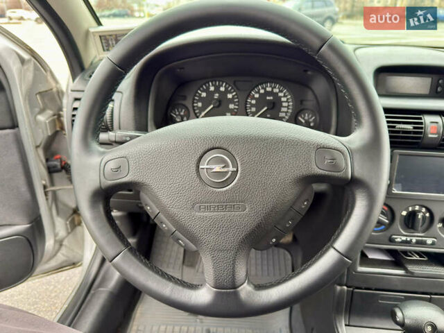 Серый Опель Астра, объемом двигателя 1.6 л и пробегом 179 тыс. км за 5200 $, фото 32 на Automoto.ua