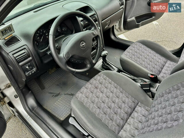 Серый Опель Астра, объемом двигателя 1.6 л и пробегом 179 тыс. км за 5200 $, фото 41 на Automoto.ua