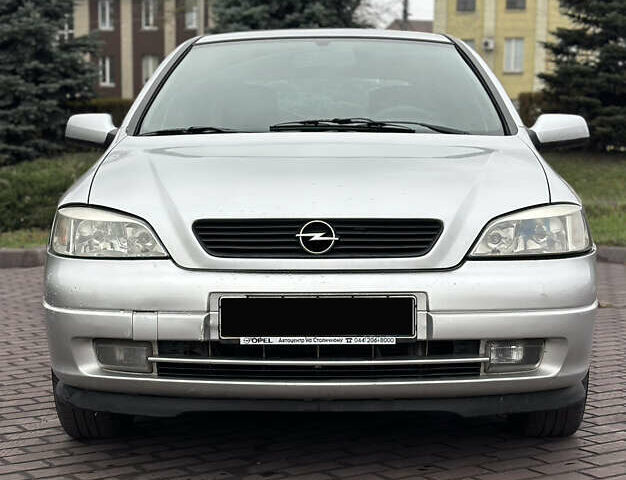 Сірий Опель Астра, об'ємом двигуна 1.6 л та пробігом 295 тис. км за 3999 $, фото 3 на Automoto.ua