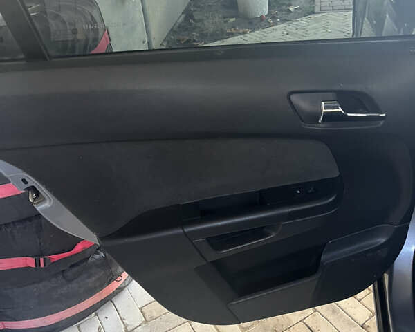 Серый Опель Астра, объемом двигателя 1.6 л и пробегом 260 тыс. км за 4400 $, фото 13 на Automoto.ua