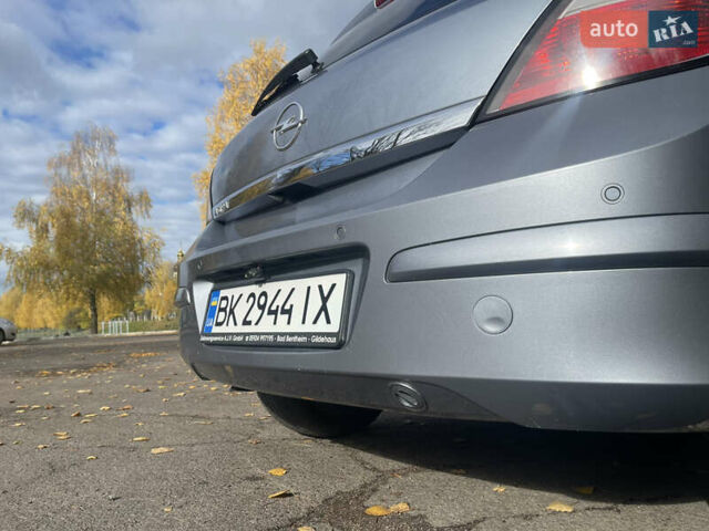 Серый Опель Астра, объемом двигателя 1.82 л и пробегом 213 тыс. км за 5800 $, фото 8 на Automoto.ua