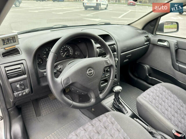 Серый Опель Астра, объемом двигателя 1.6 л и пробегом 179 тыс. км за 5200 $, фото 7 на Automoto.ua