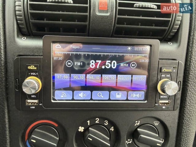 Серый Опель Астра, объемом двигателя 1.6 л и пробегом 179 тыс. км за 5200 $, фото 19 на Automoto.ua