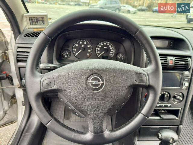 Серый Опель Астра, объемом двигателя 1.6 л и пробегом 179 тыс. км за 5200 $, фото 27 на Automoto.ua