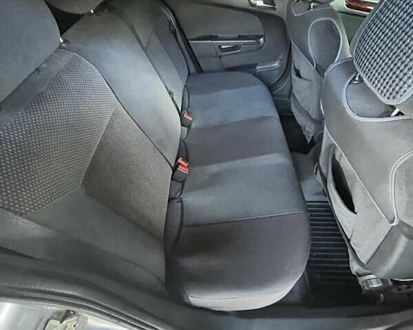 Серый Опель Астра, объемом двигателя 1.6 л и пробегом 260 тыс. км за 4400 $, фото 11 на Automoto.ua