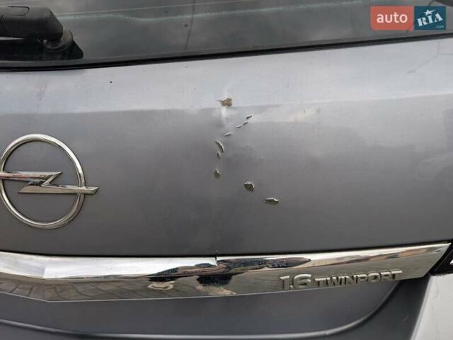 Серый Опель Астра, объемом двигателя 1.6 л и пробегом 290 тыс. км за 4999 $, фото 6 на Automoto.ua