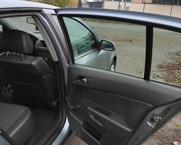 Серый Опель Астра, объемом двигателя 1.9 л и пробегом 353 тыс. км за 5850 $, фото 10 на Automoto.ua