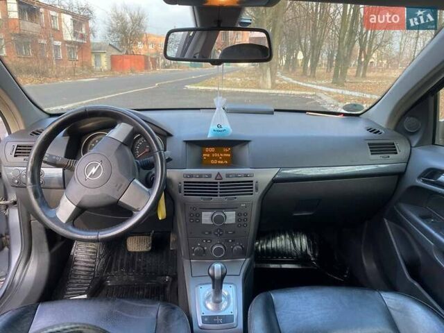 Серый Опель Астра, объемом двигателя 1.6 л и пробегом 210 тыс. км за 5200 $, фото 10 на Automoto.ua