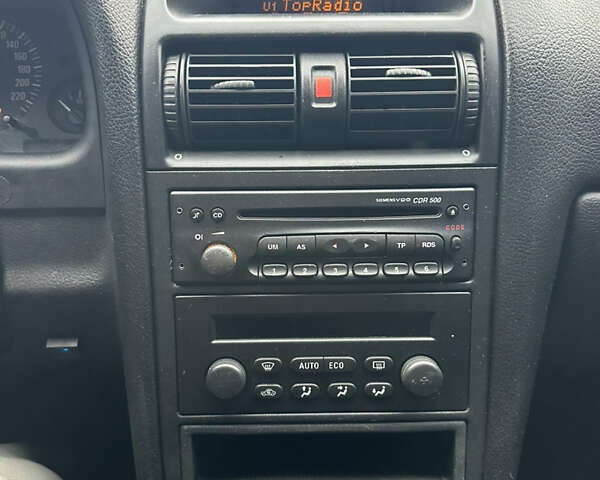 Сірий Опель Астра, об'ємом двигуна 1.6 л та пробігом 295 тис. км за 3999 $, фото 22 на Automoto.ua