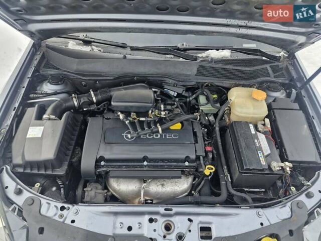 Серый Опель Астра, объемом двигателя 1.6 л и пробегом 250 тыс. км за 3600 $, фото 7 на Automoto.ua