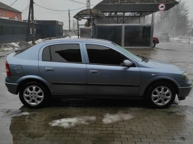 Серый Опель Астра, объемом двигателя 1.6 л и пробегом 157 тыс. км за 3600 $, фото 2 на Automoto.ua