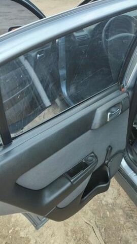 Серый Опель Астра, объемом двигателя 1.39 л и пробегом 330 тыс. км за 3400 $, фото 8 на Automoto.ua