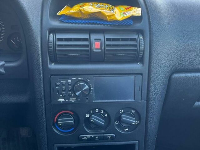 Серый Опель Астра, объемом двигателя 1.6 л и пробегом 266 тыс. км за 2700 $, фото 5 на Automoto.ua