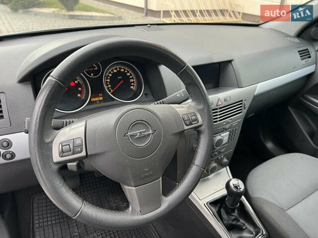 Серый Опель Астра, объемом двигателя 1.6 л и пробегом 259 тыс. км за 5100 $, фото 28 на Automoto.ua
