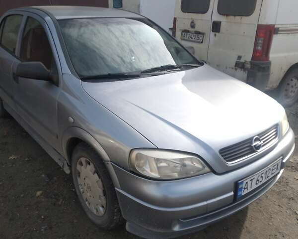 Серый Опель Астра, объемом двигателя 1.36 л и пробегом 202 тыс. км за 3200 $, фото 7 на Automoto.ua