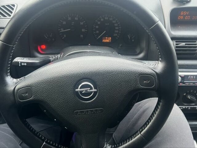 Серый Опель Астра, объемом двигателя 1.4 л и пробегом 200 тыс. км за 4000 $, фото 4 на Automoto.ua