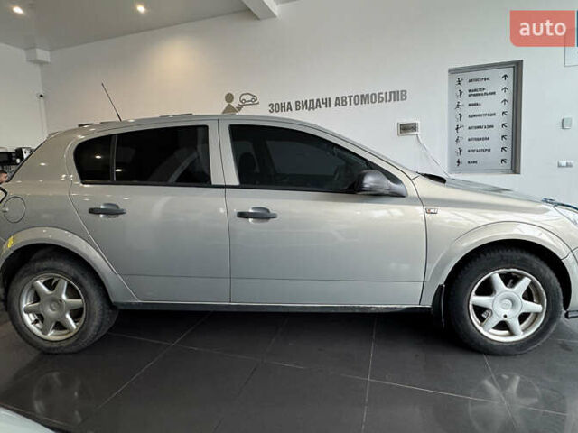 Серый Опель Астра, объемом двигателя 1.4 л и пробегом 215 тыс. км за 4100 $, фото 7 на Automoto.ua