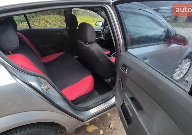 Серый Опель Астра, объемом двигателя 1.4 л и пробегом 327 тыс. км за 4400 $, фото 19 на Automoto.ua