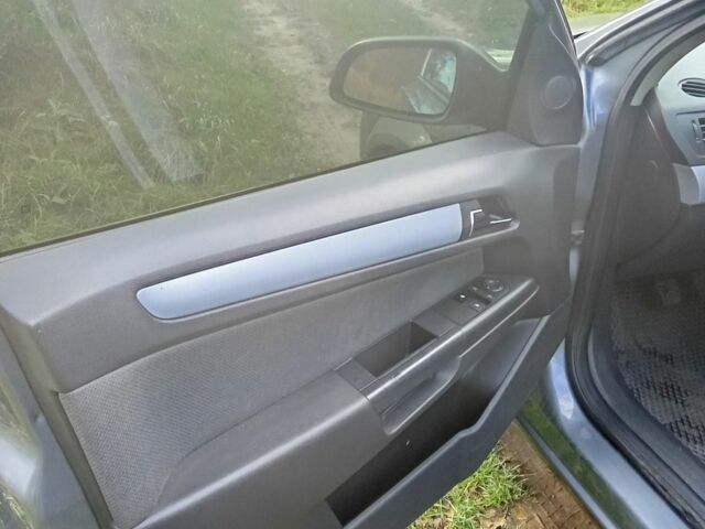 Серый Опель Астра, объемом двигателя 1.4 л и пробегом 210 тыс. км за 4650 $, фото 5 на Automoto.ua