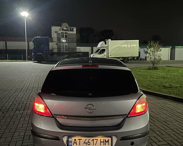 Серый Опель Астра, объемом двигателя 1.7 л и пробегом 241 тыс. км за 3650 $, фото 10 на Automoto.ua