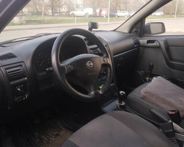 Серый Опель Астра, объемом двигателя 1.36 л и пробегом 202 тыс. км за 3200 $, фото 3 на Automoto.ua