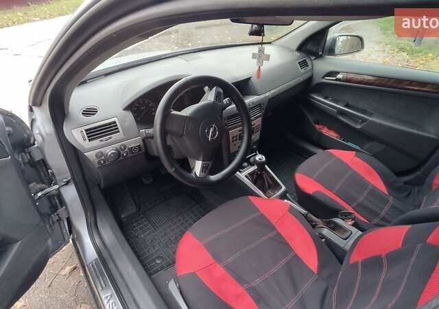 Серый Опель Астра, объемом двигателя 1.4 л и пробегом 327 тыс. км за 4400 $, фото 24 на Automoto.ua