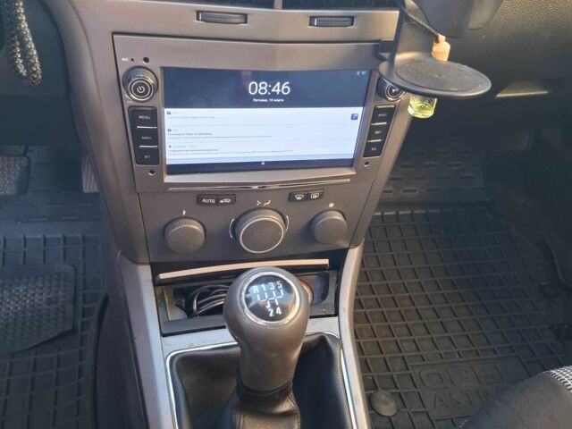 Серый Опель Астра, объемом двигателя 1.6 л и пробегом 285 тыс. км за 5200 $, фото 6 на Automoto.ua