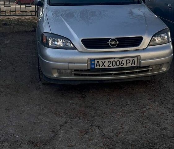 Серый Опель Астра, объемом двигателя 1.4 л и пробегом 200 тыс. км за 4000 $, фото 1 на Automoto.ua