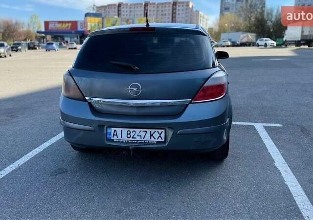 Серый Опель Астра, объемом двигателя 1.9 л и пробегом 433 тыс. км за 4400 $, фото 3 на Automoto.ua