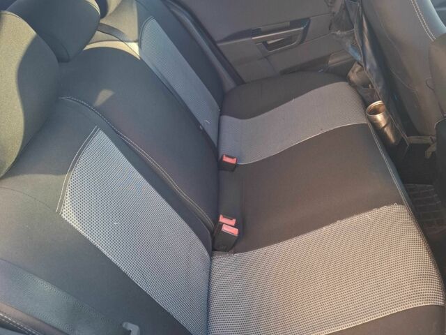 Серый Опель Астра, объемом двигателя 1.6 л и пробегом 285 тыс. км за 5200 $, фото 7 на Automoto.ua