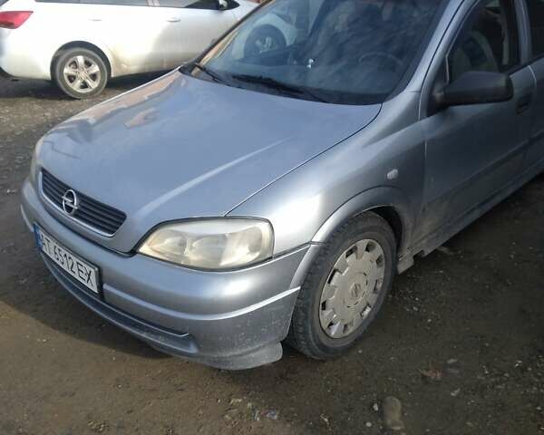 Серый Опель Астра, объемом двигателя 1.36 л и пробегом 202 тыс. км за 3200 $, фото 8 на Automoto.ua