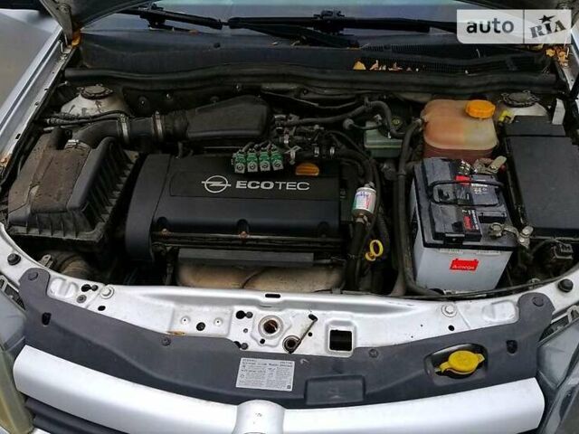 Серый Опель Астра, объемом двигателя 1.6 л и пробегом 233 тыс. км за 5100 $, фото 2 на Automoto.ua