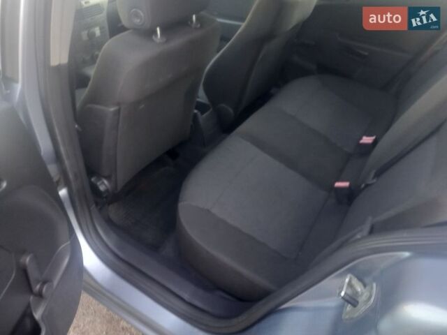 Серый Опель Астра, объемом двигателя 1.6 л и пробегом 204 тыс. км за 4450 $, фото 10 на Automoto.ua