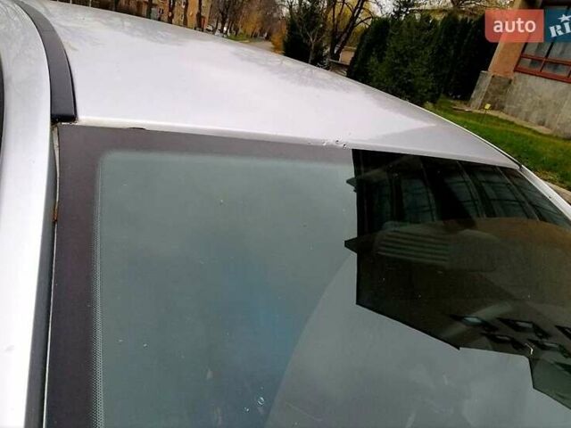 Серый Опель Астра, объемом двигателя 1.6 л и пробегом 233 тыс. км за 5100 $, фото 7 на Automoto.ua