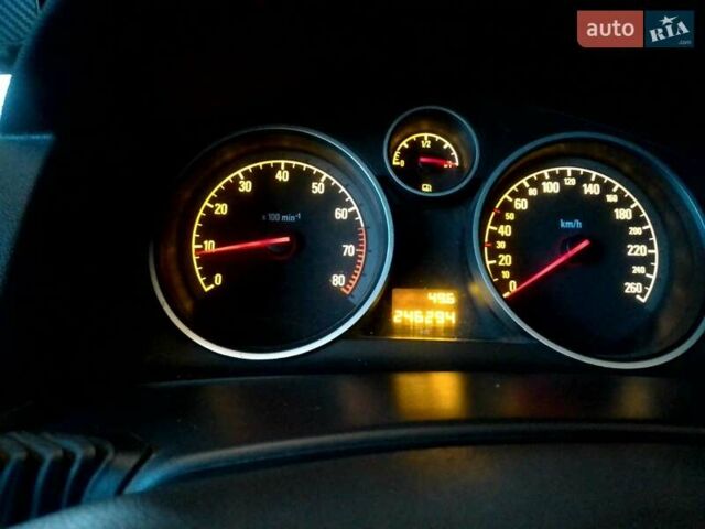 Серый Опель Астра, объемом двигателя 1.6 л и пробегом 246 тыс. км за 5400 $, фото 9 на Automoto.ua