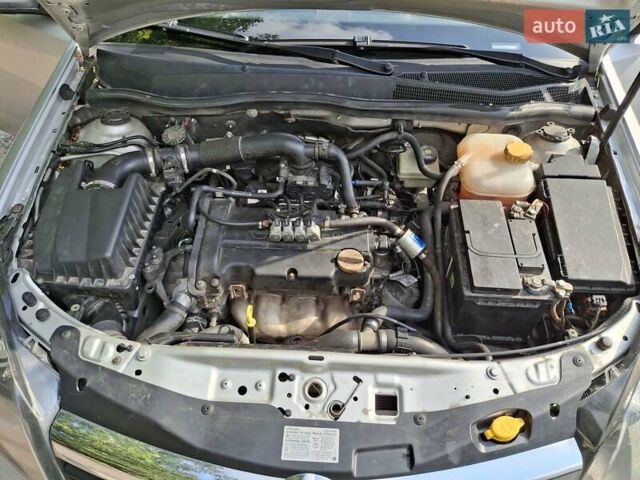 Серый Опель Астра, объемом двигателя 1.4 л и пробегом 518 тыс. км за 4700 $, фото 4 на Automoto.ua