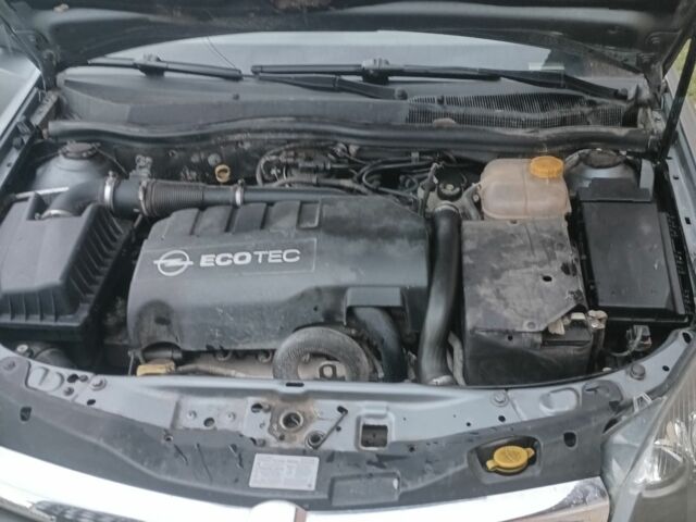 Серый Опель Астра, объемом двигателя 1.2 л и пробегом 325 тыс. км за 3750 $, фото 7 на Automoto.ua