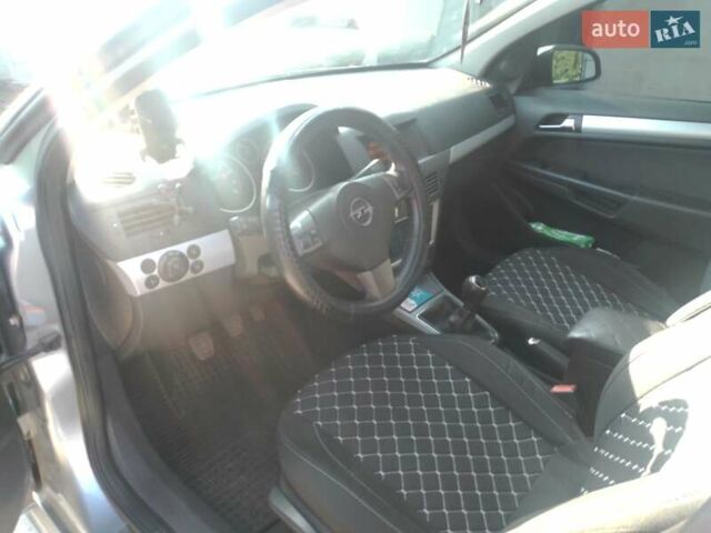 Серый Опель Астра, объемом двигателя 1.6 л и пробегом 246 тыс. км за 5400 $, фото 7 на Automoto.ua