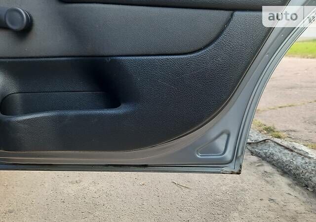 Серый Опель Астра, объемом двигателя 1.4 л и пробегом 280 тыс. км за 4000 $, фото 8 на Automoto.ua