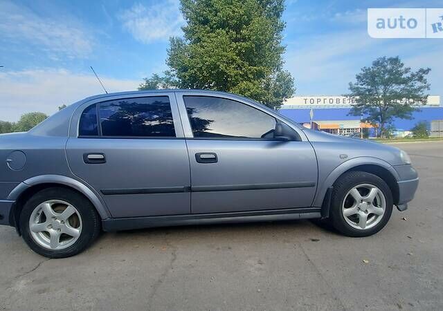 Серый Опель Астра, объемом двигателя 1.4 л и пробегом 280 тыс. км за 4000 $, фото 3 на Automoto.ua