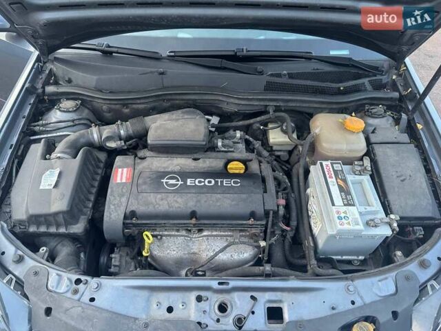 Серый Опель Астра, объемом двигателя 1.6 л и пробегом 233 тыс. км за 4800 $, фото 12 на Automoto.ua