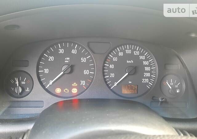 Серый Опель Астра, объемом двигателя 1.4 л и пробегом 280 тыс. км за 4000 $, фото 19 на Automoto.ua