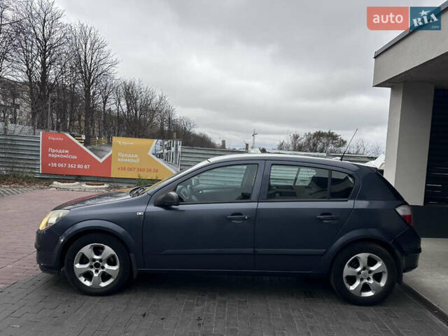 Серый Опель Астра, объемом двигателя 1.2 л и пробегом 274 тыс. км за 3399 $, фото 6 на Automoto.ua