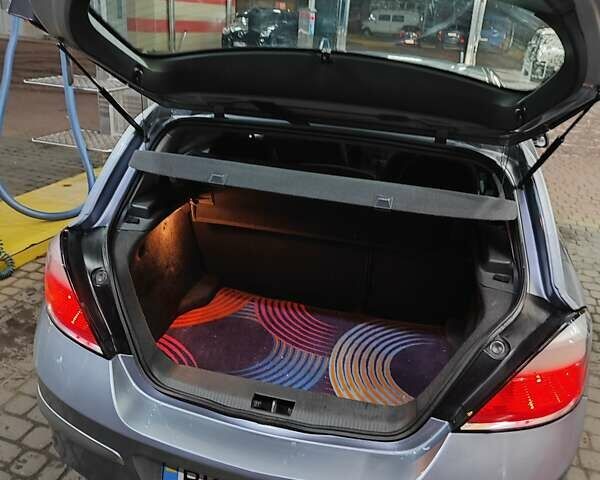 Серый Опель Астра, объемом двигателя 1.4 л и пробегом 257 тыс. км за 4499 $, фото 9 на Automoto.ua