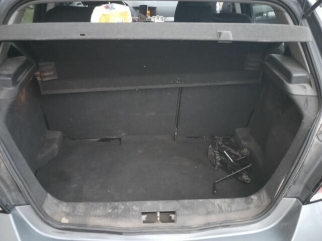 Серый Опель Астра, объемом двигателя 1.2 л и пробегом 325 тыс. км за 3750 $, фото 9 на Automoto.ua