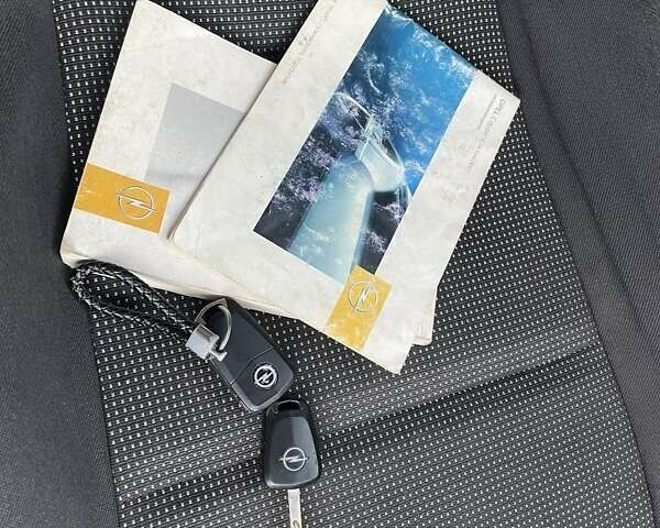 Серый Опель Астра, объемом двигателя 1.4 л и пробегом 220 тыс. км за 3450 $, фото 18 на Automoto.ua