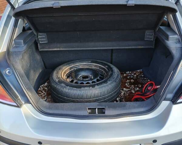 Серый Опель Астра, объемом двигателя 1.4 л и пробегом 216 тыс. км за 4500 $, фото 19 на Automoto.ua